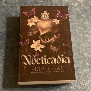 Noctecadia by Keri Lake — Dark Skull Cover with Purple Butterflies
